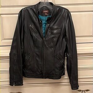 Woman’s Danier leather modern moto jacket.  Black.  Size Small.